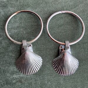 Silver Shell wall mount towel ring.